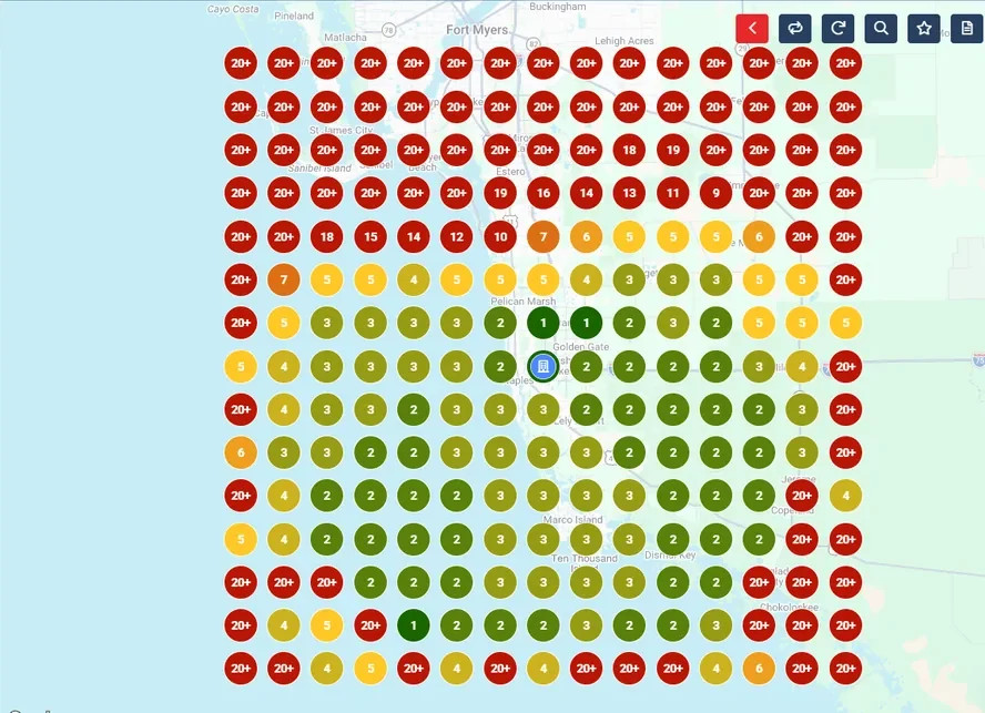 Geo-grid rank scan over a Southwest Florida map. Green pins showing first and second position cluster tightly around the business location near Naples, shading through yellow and orange, to red 20-plus pins across the outer edges of the grid toward Fort Myers, Estero and Marco Island.